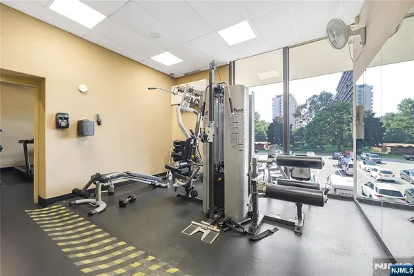a kitchen with stainless steel appliances granite countertop a stove a sink and a cabinets