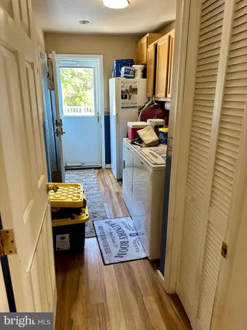 a bathroom with a sink a mirror and a bathtub