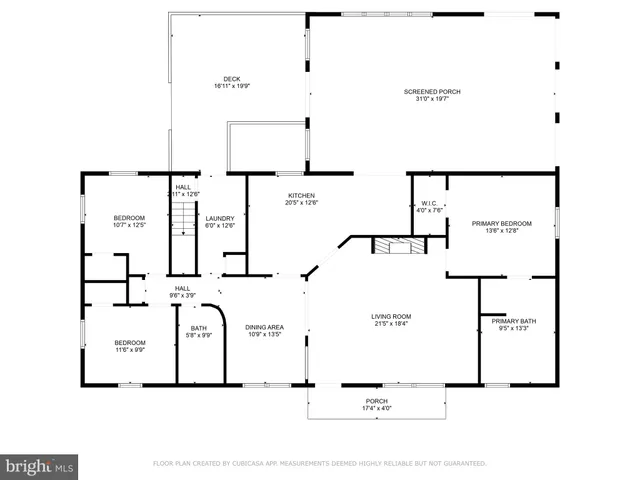 a view of a roof deck with couches and wooden floor