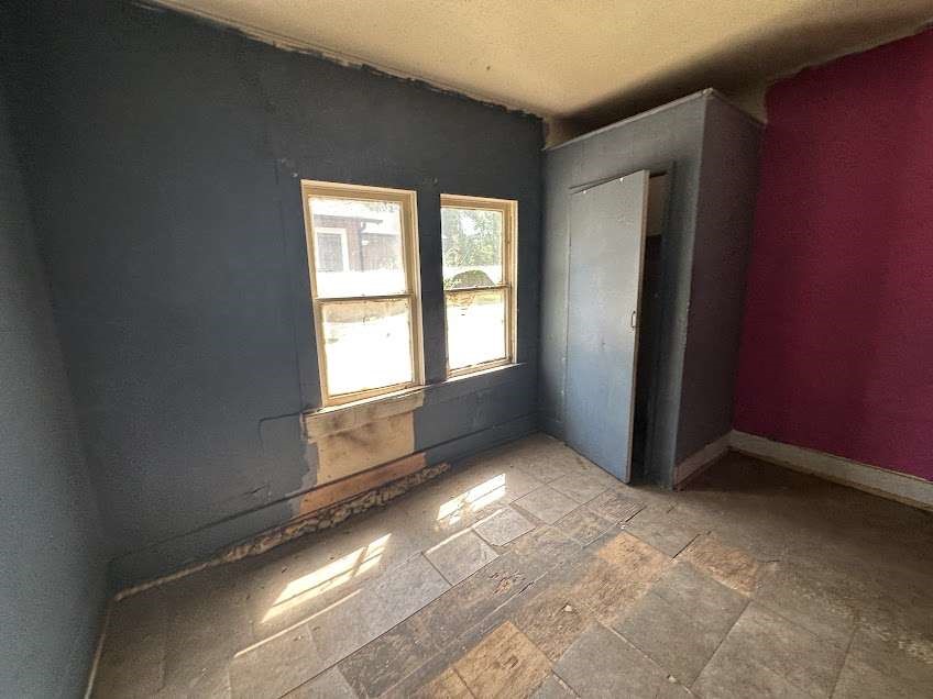 107 Electra Street Longview, TX 75602 - Photo 9 of 12 a view of empty room with window