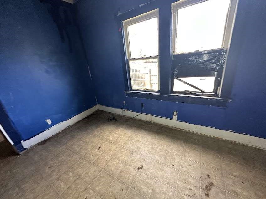 107 Electra Street Longview, TX 75602 - Photo 10 of 12 an empty room with a window