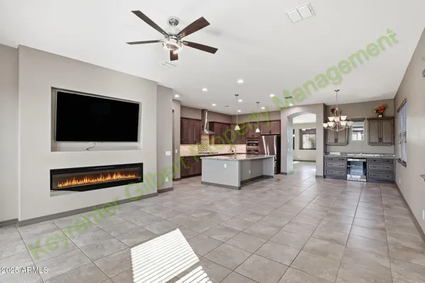 a view of a room with window and chandelier