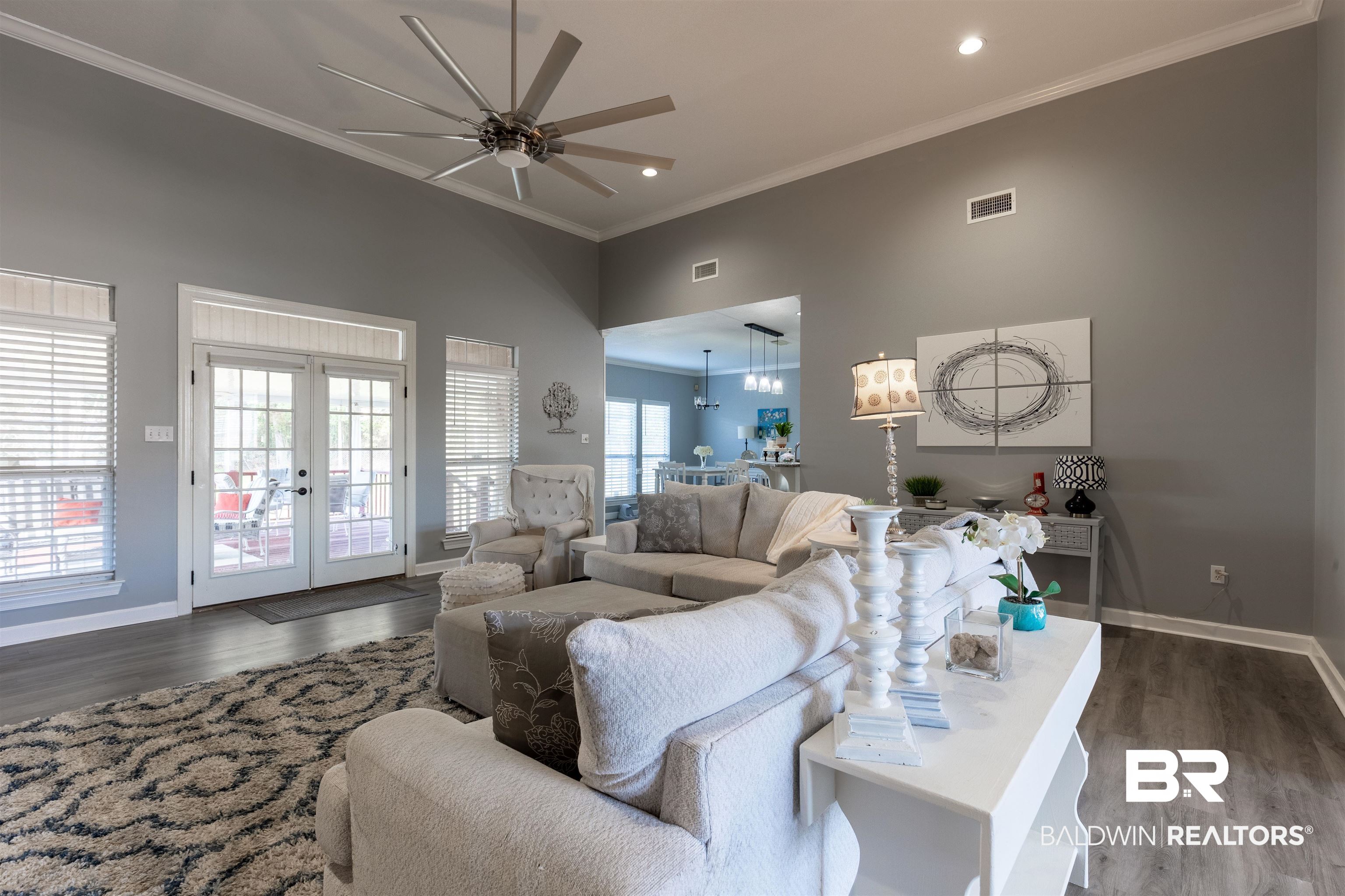 6436 Cherry Ridge Court West Mobile, AL 36695 - Photo 12 of 26 Living area with ceiling fan, french doors, crown molding, and dark wood finished floors