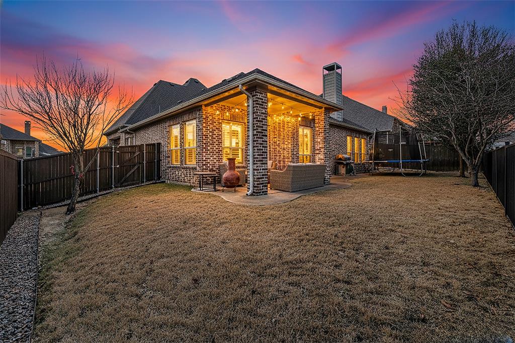 10104 Gentry Drive Frisco, TX 75035 - Photo 29 of 39 a view of a house with a yard