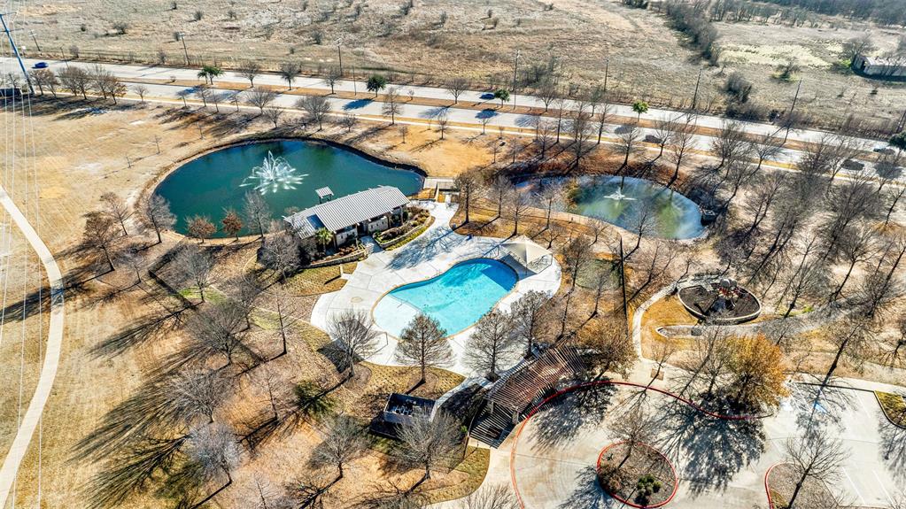 10104 Gentry Drive Frisco, TX 75035 - Photo 34 of 39 an aerial view of residential houses with outdoor space