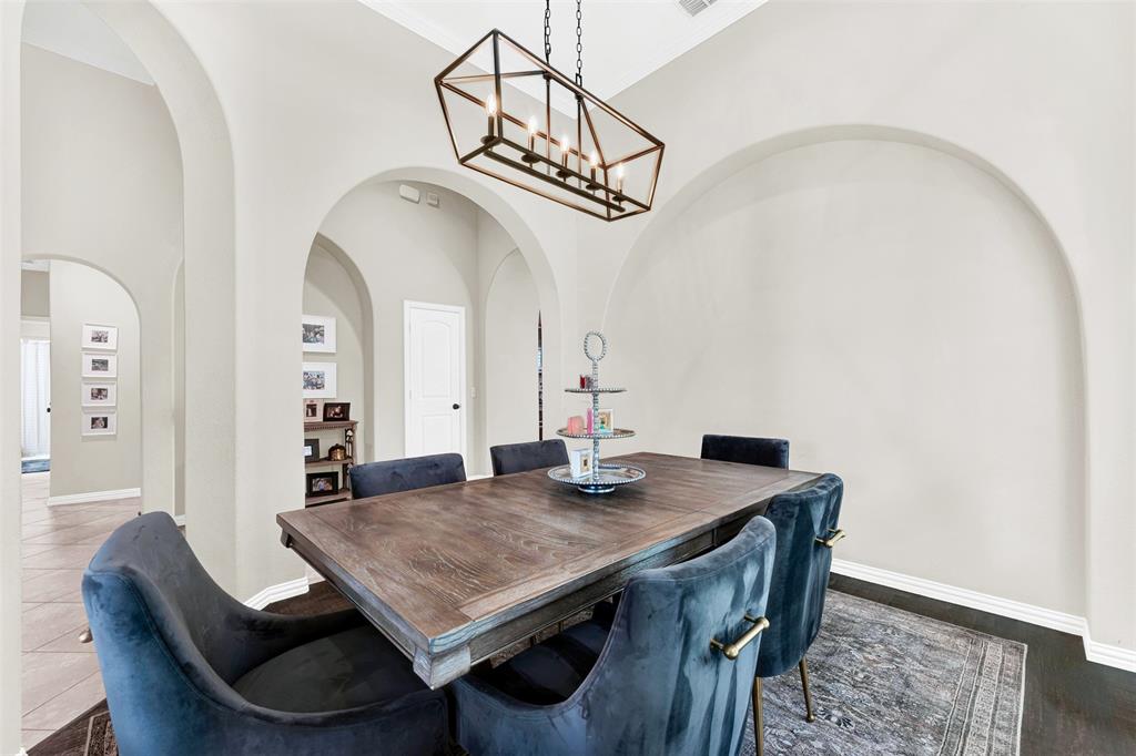 10104 Gentry Drive Frisco, TX 75035 - Photo 6 of 39 a view of a dining room and livingroom with furniture