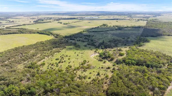 a view of a terrace with a lake view