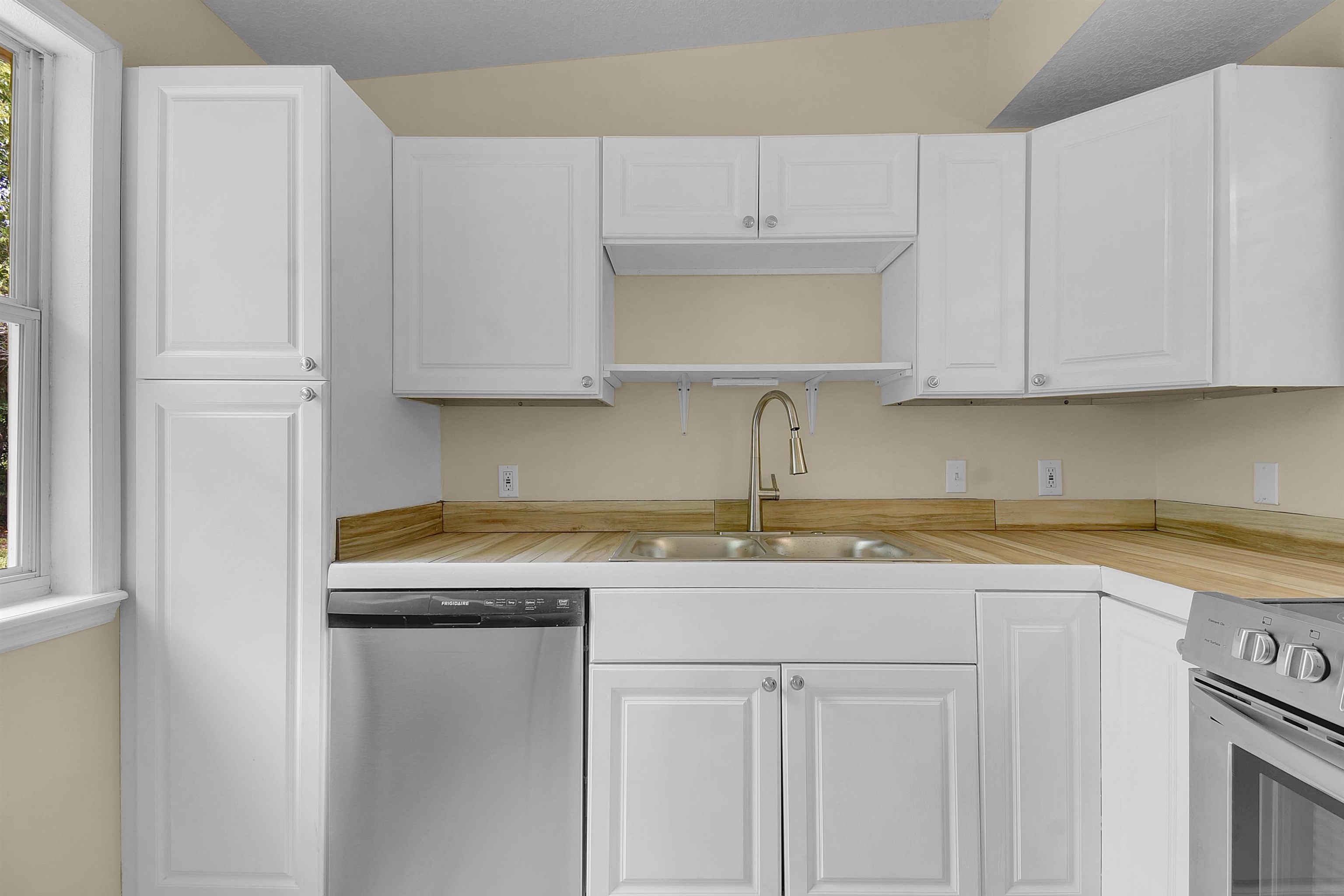 228 Spring Street St. Augustine, FL 32084 - Photo 14 of 38 Separate Laundry room area off this kitchen