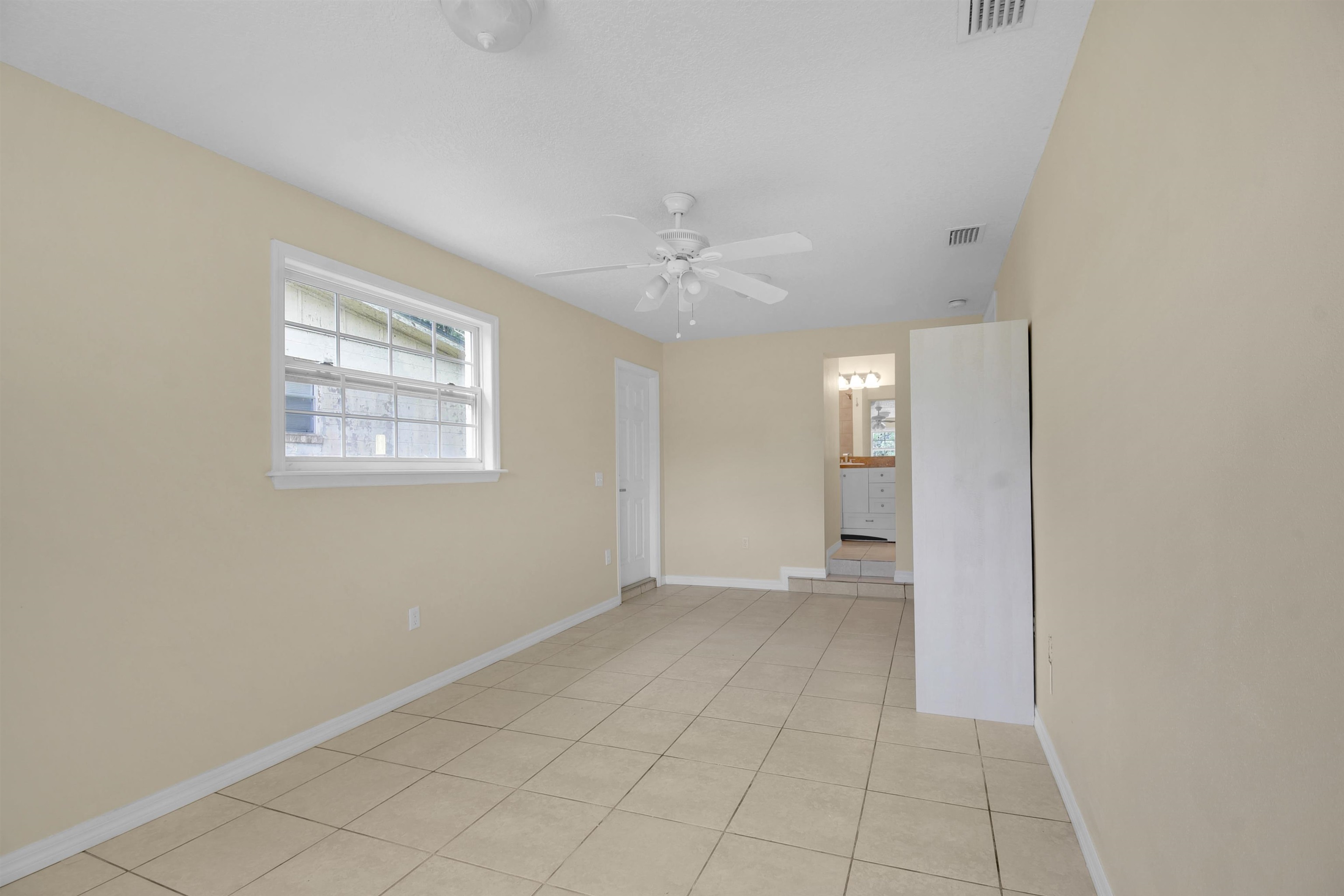 228 Spring Street St. Augustine, FL 32084 - Photo 18 of 38 High windows helps with furniture placement & privacy