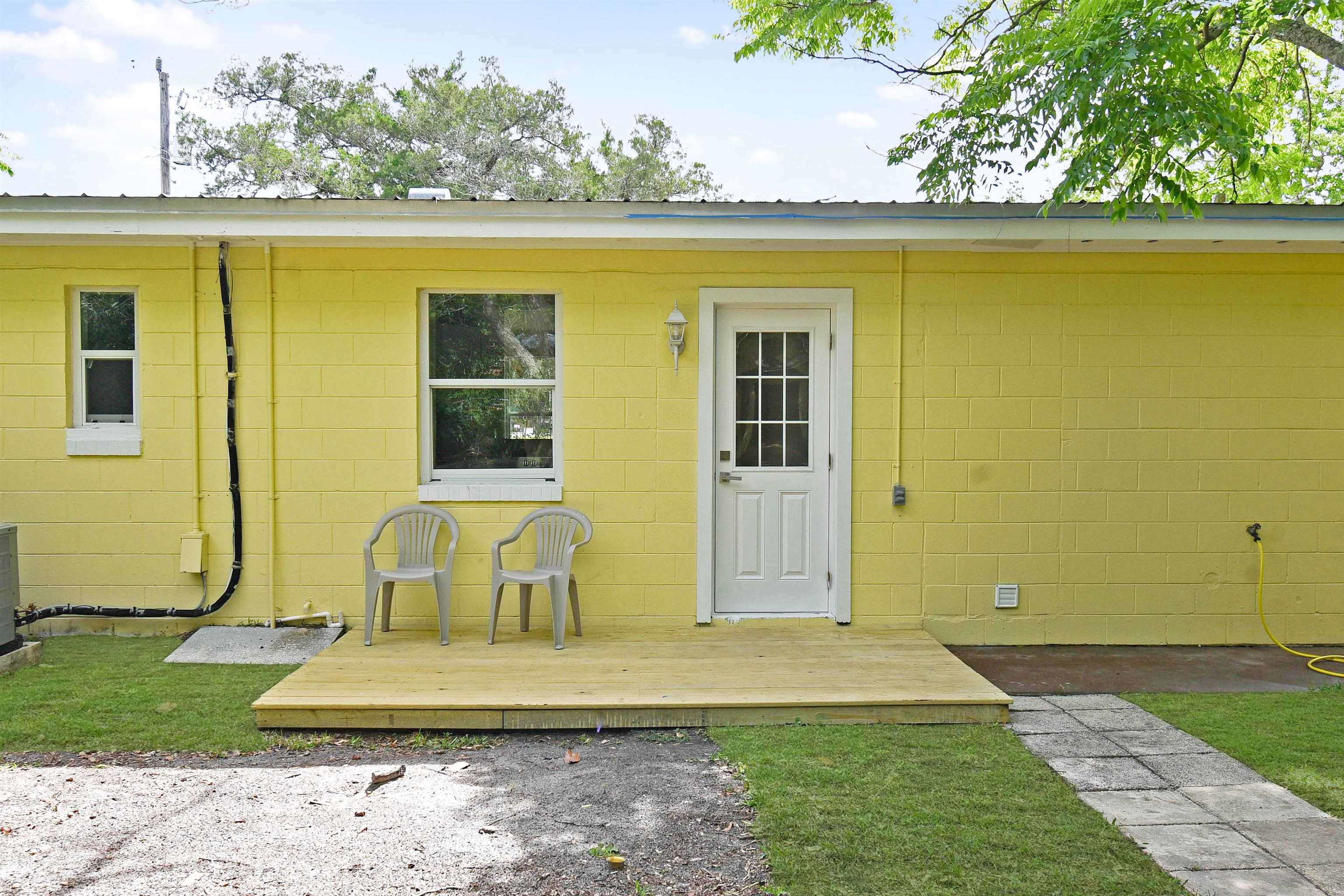 228 Spring Street St. Augustine, FL 32084 - Photo 31 of 38 Step out onto a new wooded porch