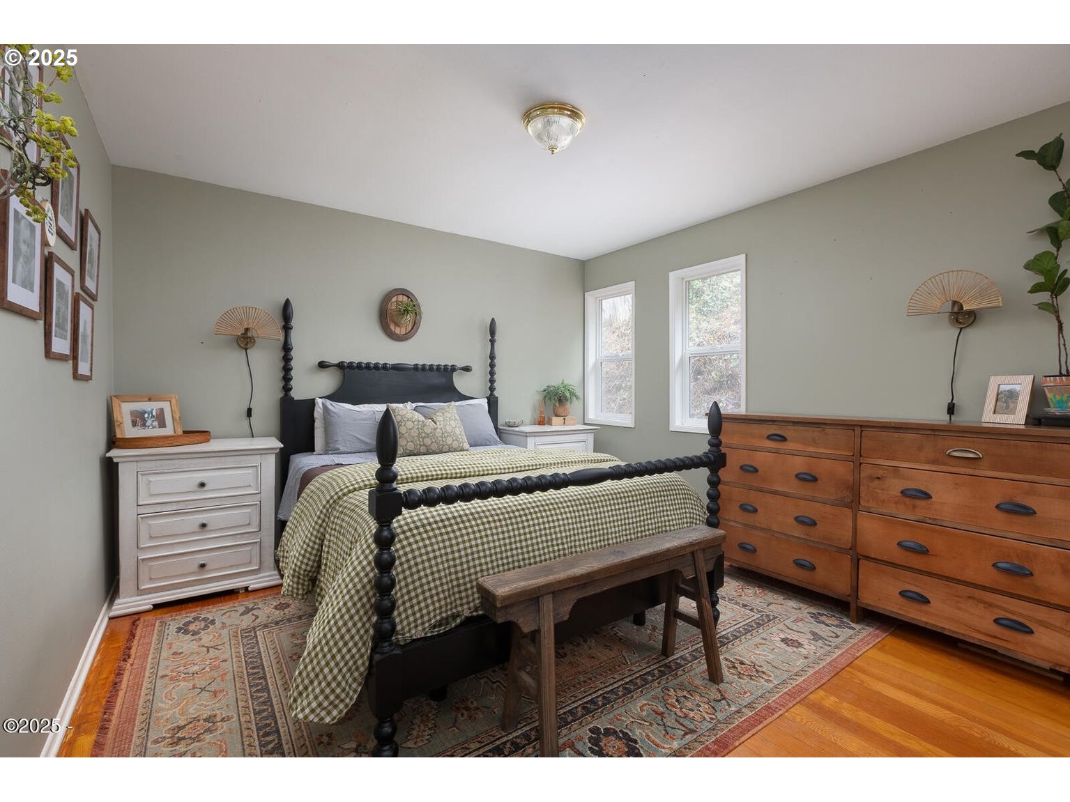 381 South Anderson Creek Road Lincoln City, OR 97367 - Photo 18 of 48 a bedroom with a bed and a dresser