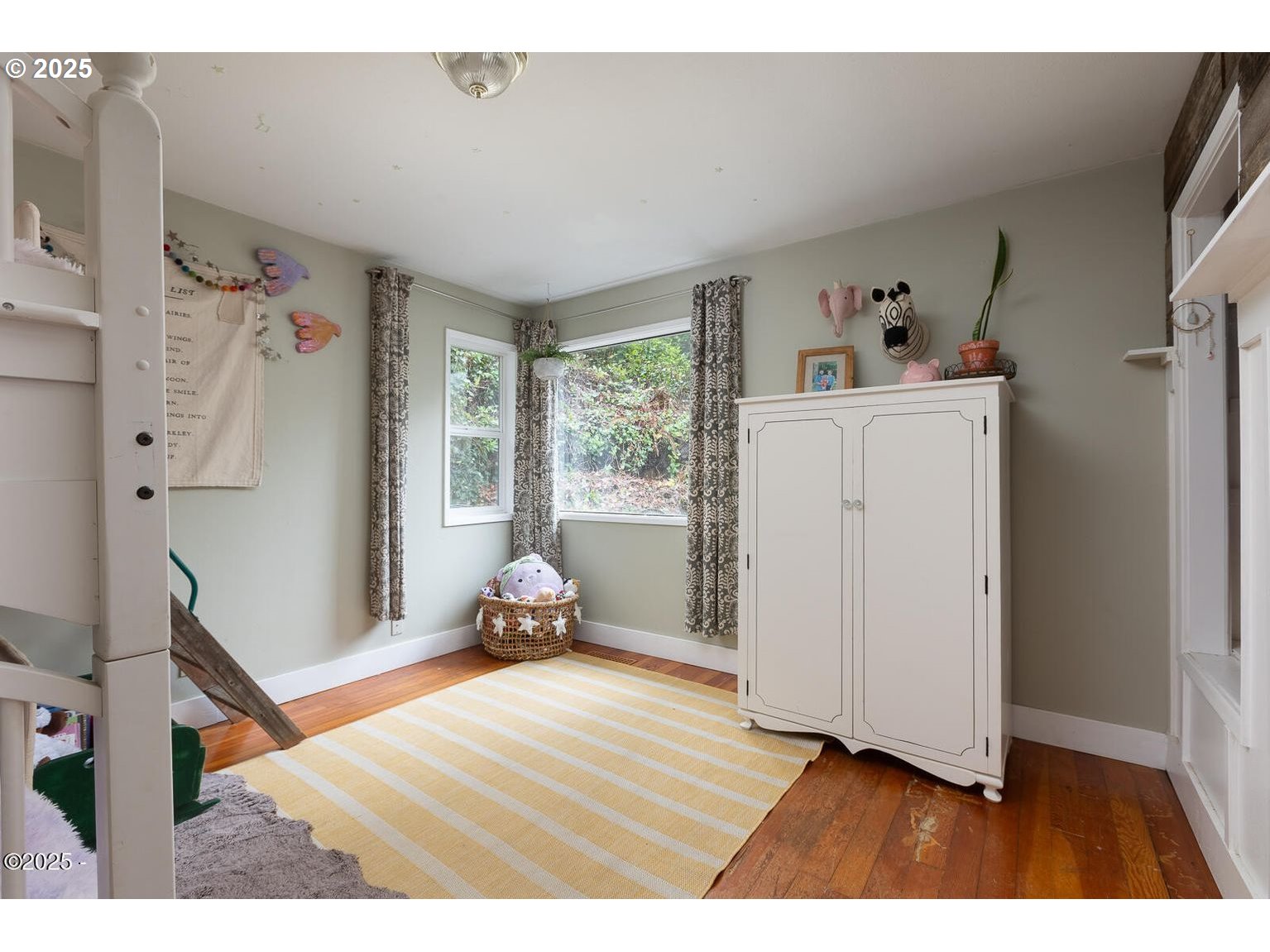 381 South Anderson Creek Road Lincoln City, OR 97367 - Photo 23 of 48 a room with a bed and a window