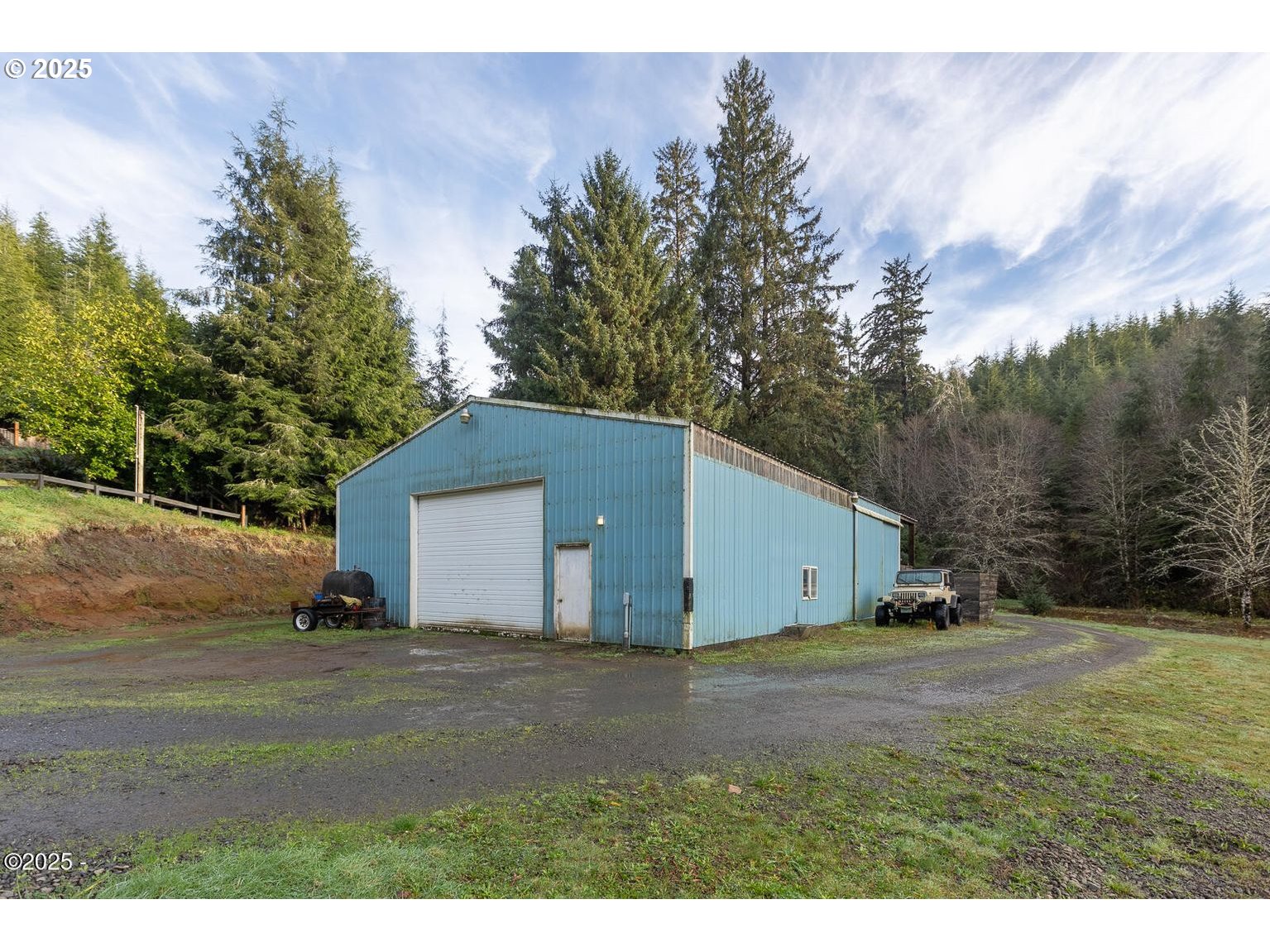 381 South Anderson Creek Road Lincoln City, OR 97367 - Photo 39 of 48 a view of a house with a yard