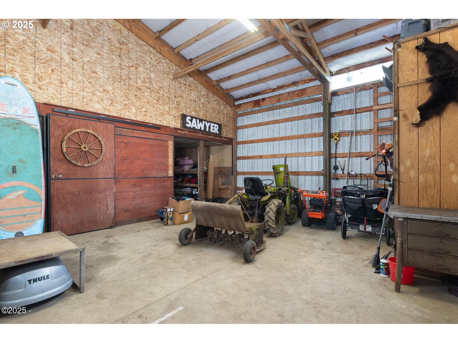 381 South Anderson Creek Road Lincoln City, OR 97367 - Photo 41 of 48 a backyard of a house with barbeque oven table and chairs