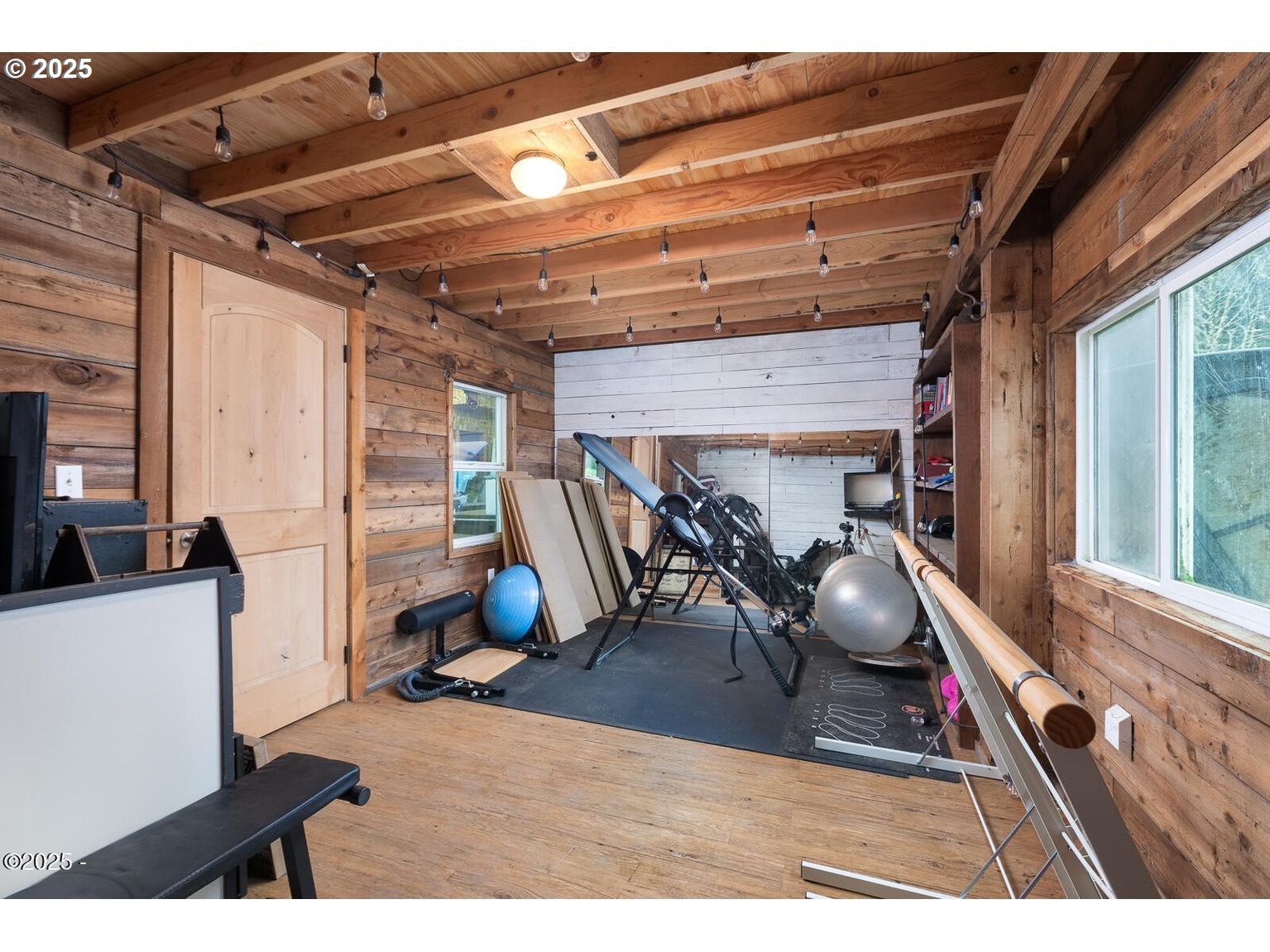 381 South Anderson Creek Road Lincoln City, OR 97367 - Photo 43 of 48 a view of a room with gym equipment