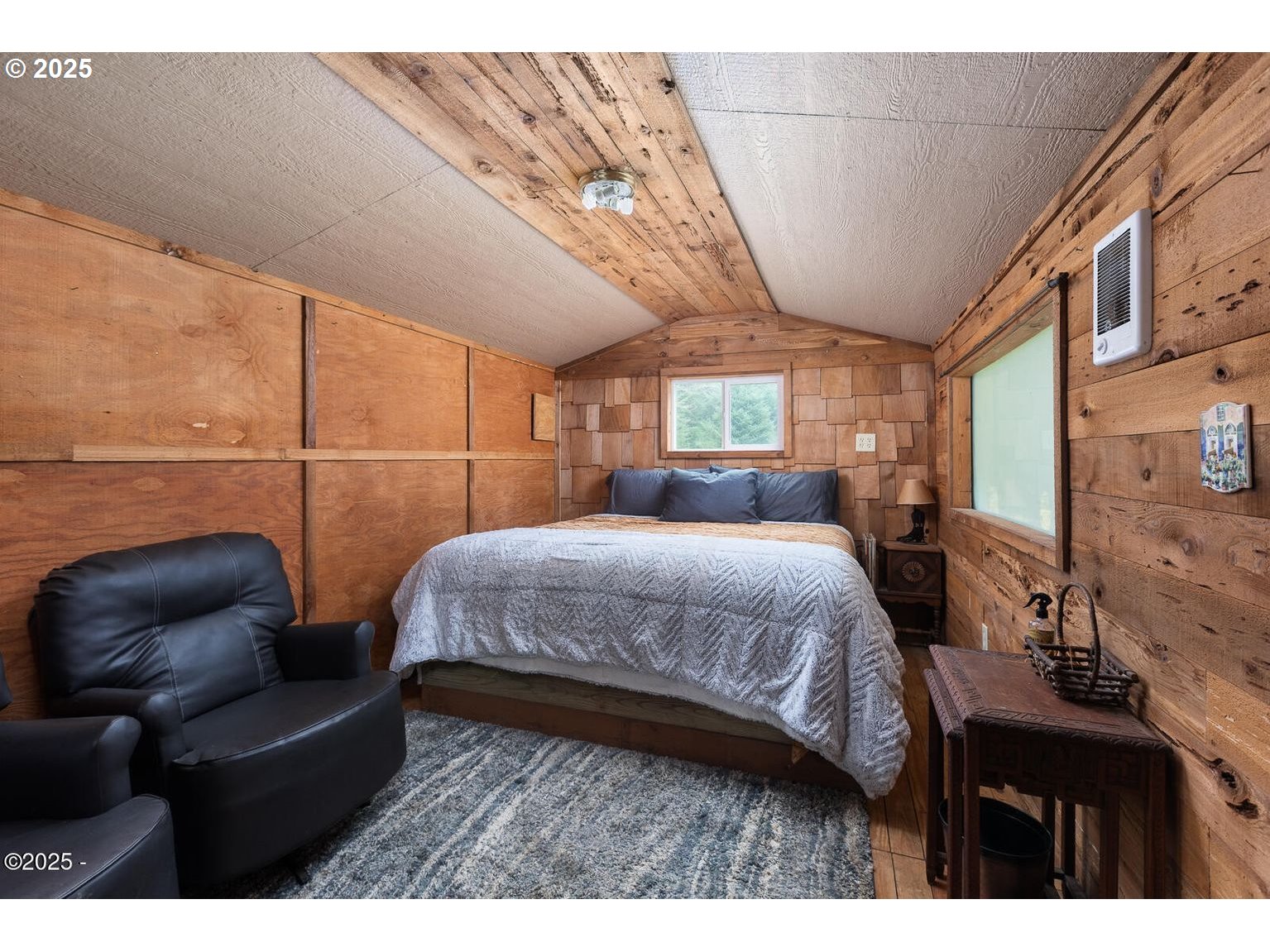 381 South Anderson Creek Road Lincoln City, OR 97367 - Photo 46 of 48 a bedroom with furniture and a large window