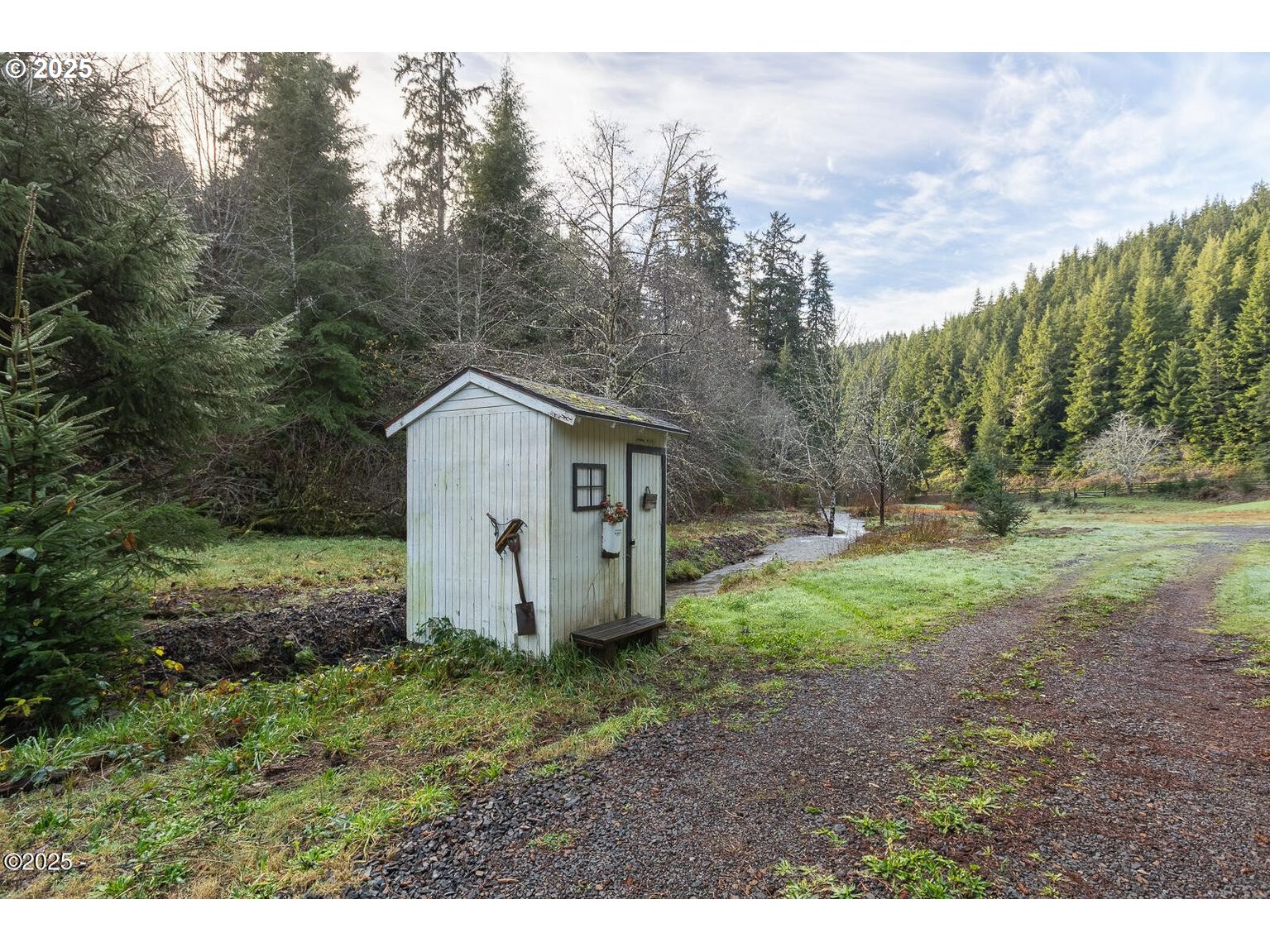 381 South Anderson Creek Road Lincoln City, OR 97367 - Photo 48 of 48 a view of a barn in the middle of a forest
