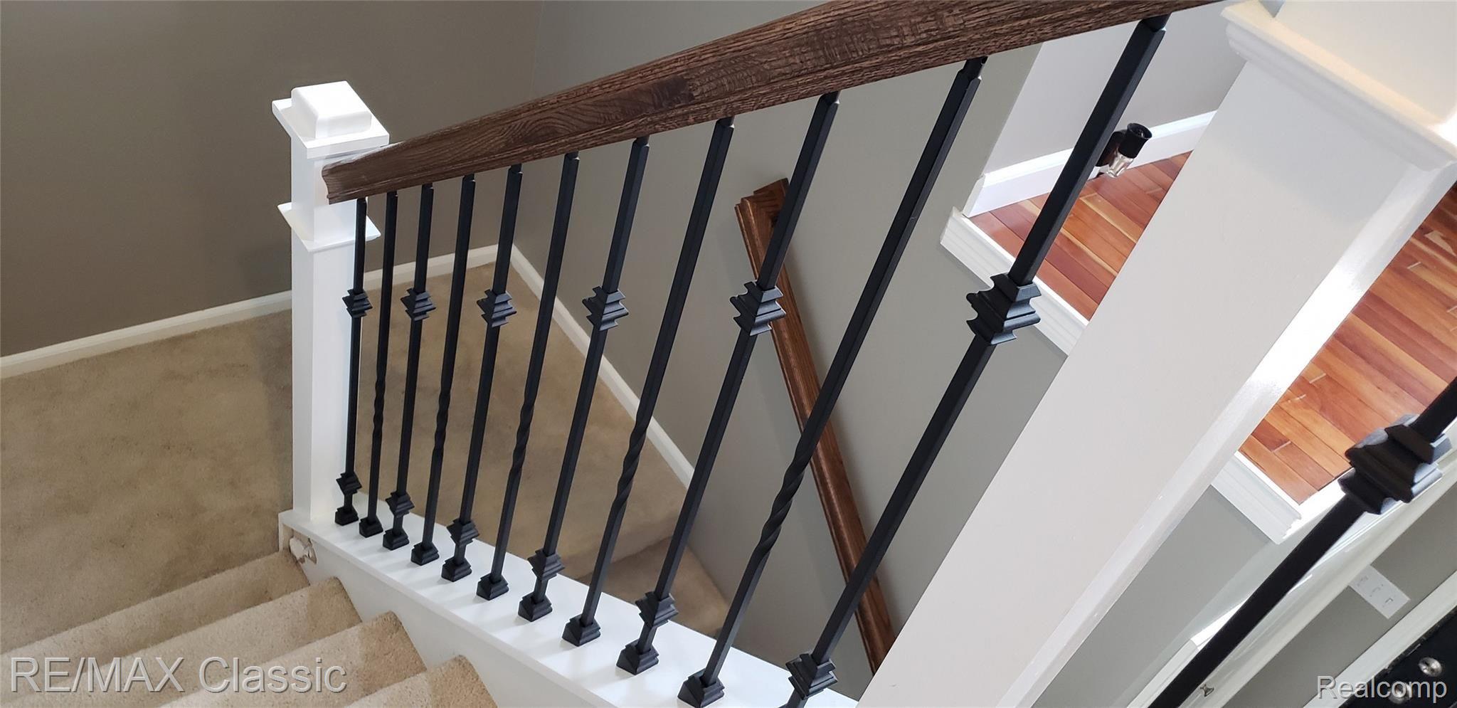 8070 Oak Grove Road Howell, MI 48855 - Photo 23 of 34 Beautiful detail in the spindles.