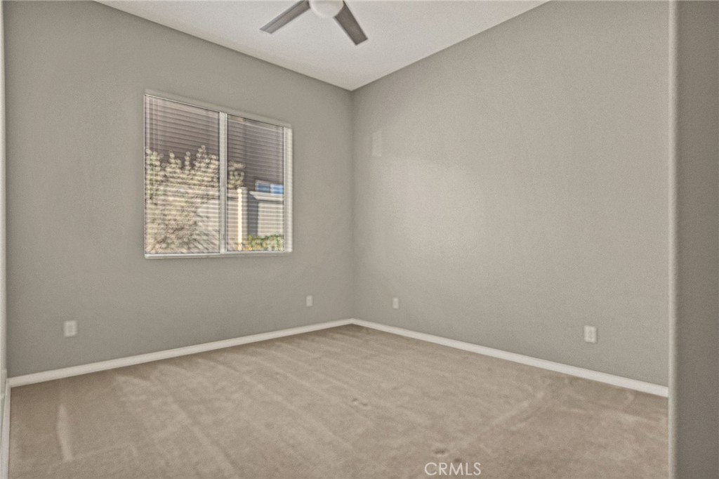 1576 Timberline Beaumont, CA 92223 - Photo 13 of 26 an empty room with a window