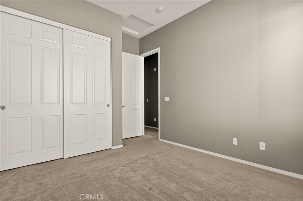 1576 Timberline Beaumont, CA 92223 - Photo 14 of 26 an empty room with closet area