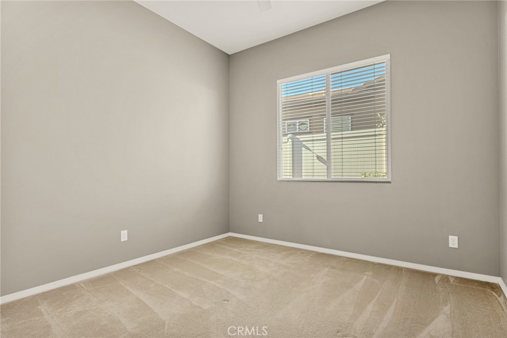1576 Timberline Beaumont, CA 92223 - Photo 15 of 26 an empty room with a window