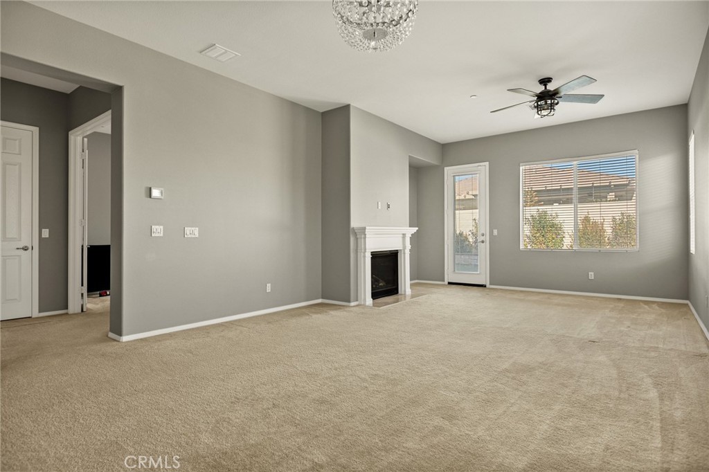 1576 Timberline Beaumont, CA 92223 - Photo 2 of 26 a view of an empty room with a window