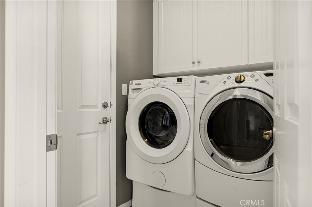 1576 Timberline Beaumont, CA 92223 - Photo 22 of 26 a utility room with dryer and washer