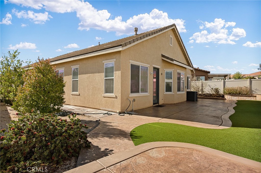 1576 Timberline Beaumont, CA 92223 - Photo 26 of 26 a front view of a house with a garden