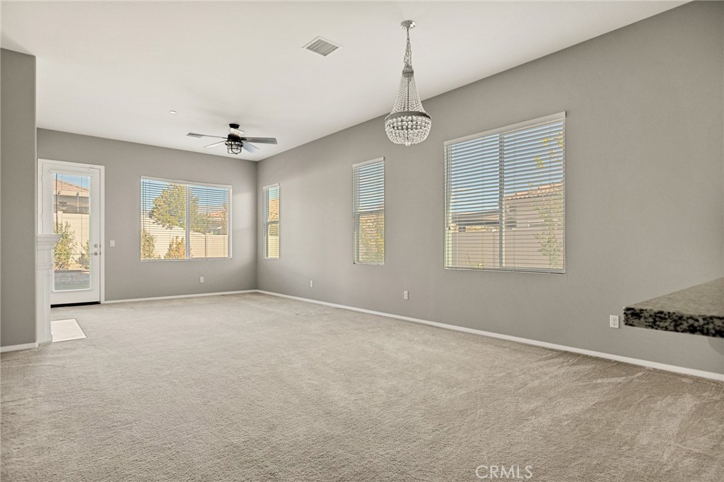 1576 Timberline Beaumont, CA 92223 - Photo 4 of 26 a view of an empty room with a window
