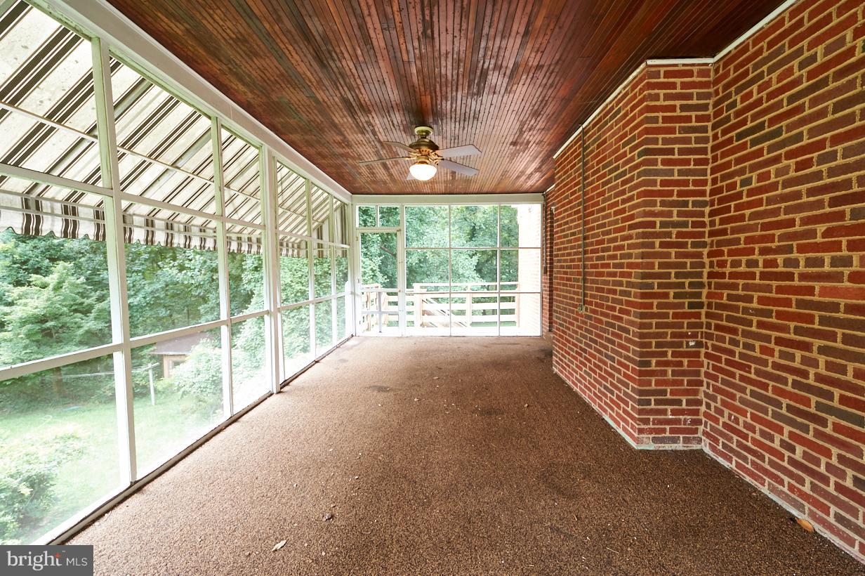4914 Sharon Road Temple Hills, MD 20748 - Photo 12 of 25 Interior Sunroom 1 with light and ceiling fan