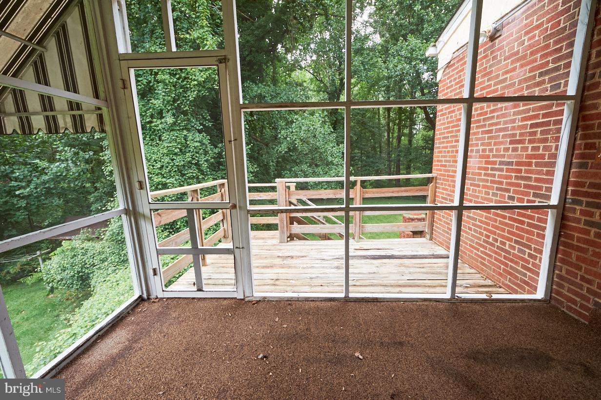 4914 Sharon Road Temple Hills, MD 20748 - Photo 13 of 25 Interior Sunroom exit to deck
