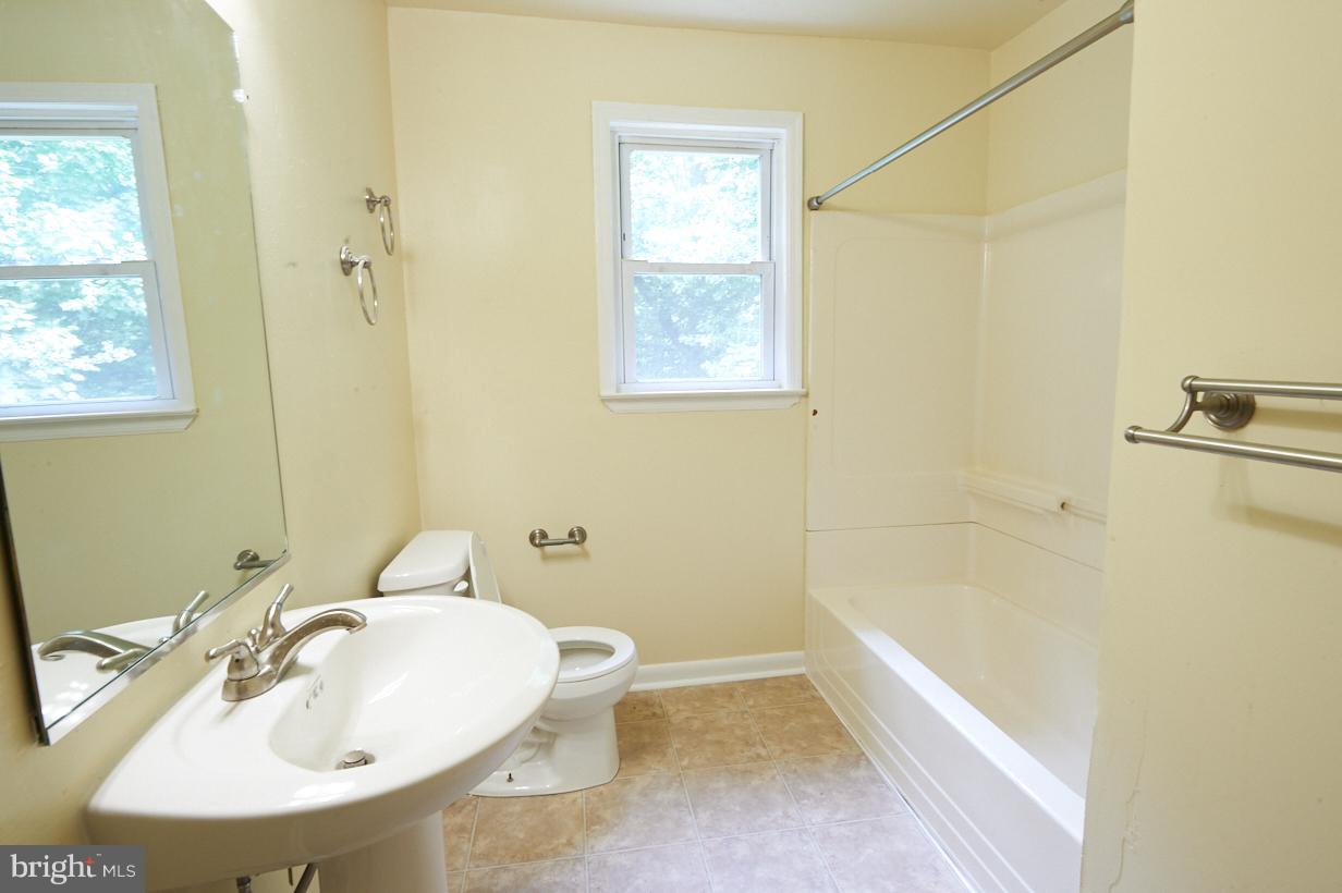 4914 Sharon Road Temple Hills, MD 20748 - Photo 14 of 25 First floor full bathroom