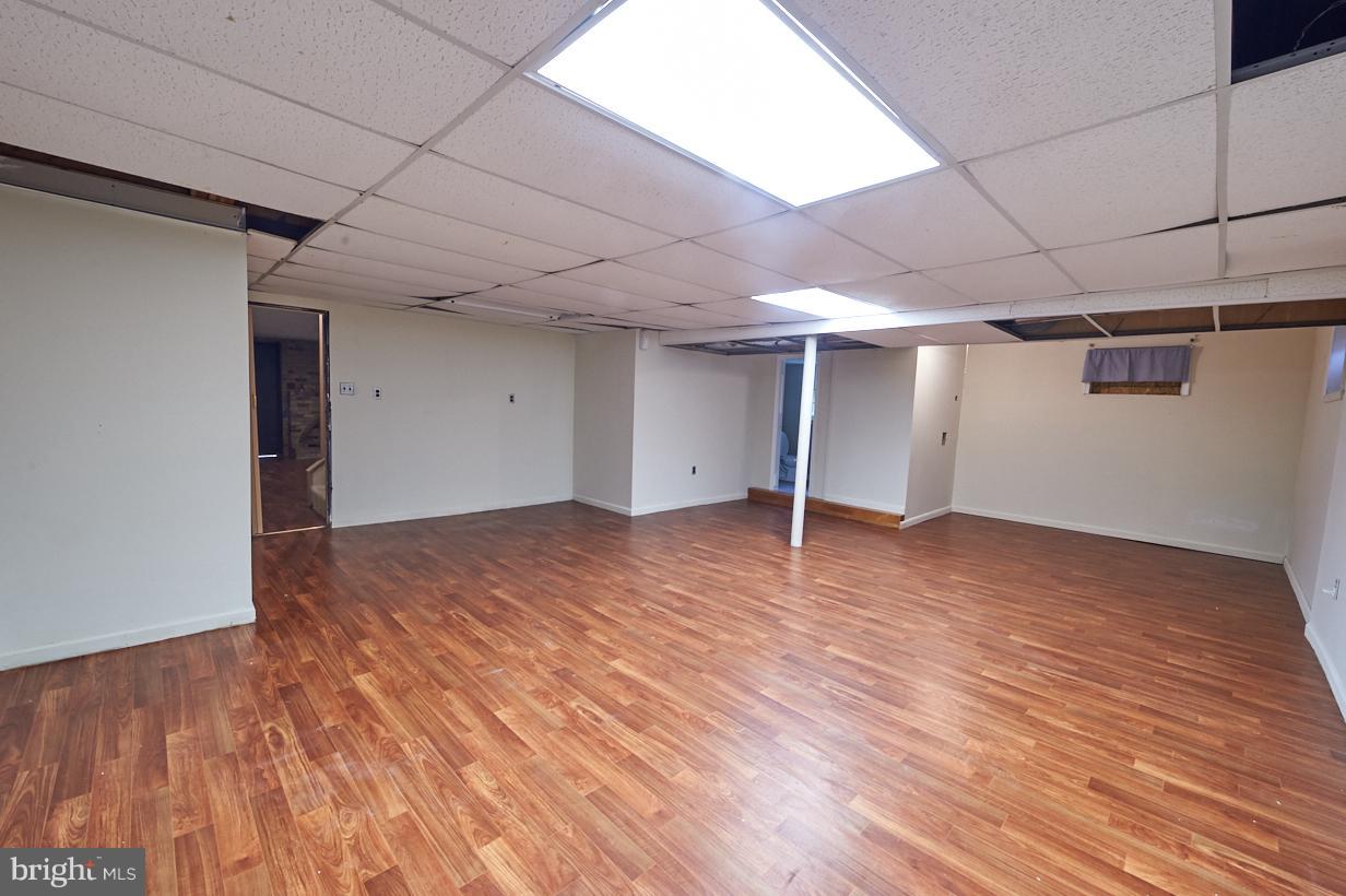 4914 Sharon Road Temple Hills, MD 20748 - Photo 18 of 25 second room w/ full bath, new flooring, new paint,