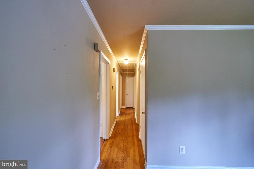 4914 Sharon Road Temple Hills, MD 20748 - Photo 5 of 25 Interior (General) oak wood floor, hall way