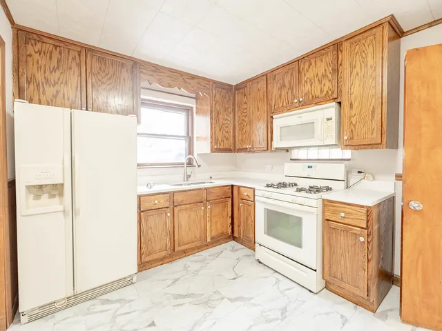 $314,900 | 6741 South Kolmar Avenue, Chicago, IL 60629