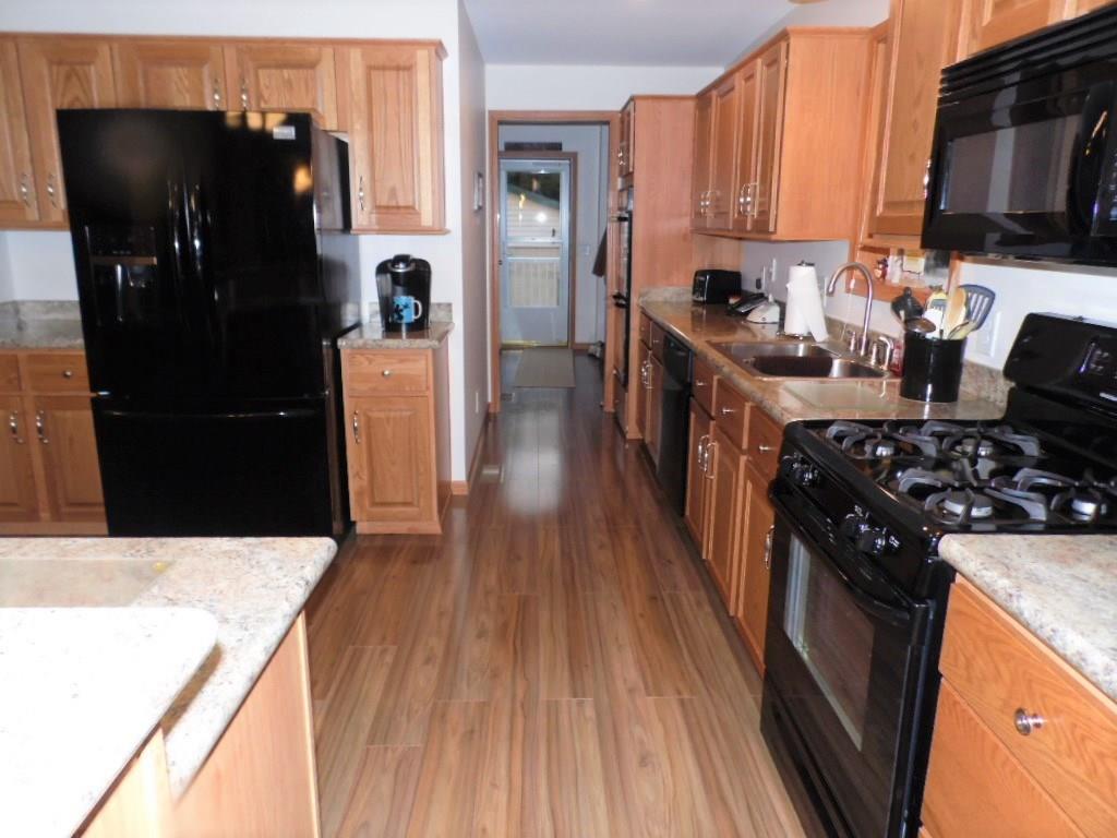 413 McGirts Road Daisytown, PA 15427 - Photo 7 of 25 ALL APPLIANCES ARE INCLUDED. THE SIDE ENTRANCE/MUDROOM HAS EXTRA STORAGE, PANTRY, AND LAUNDRY HOOK-UPS.