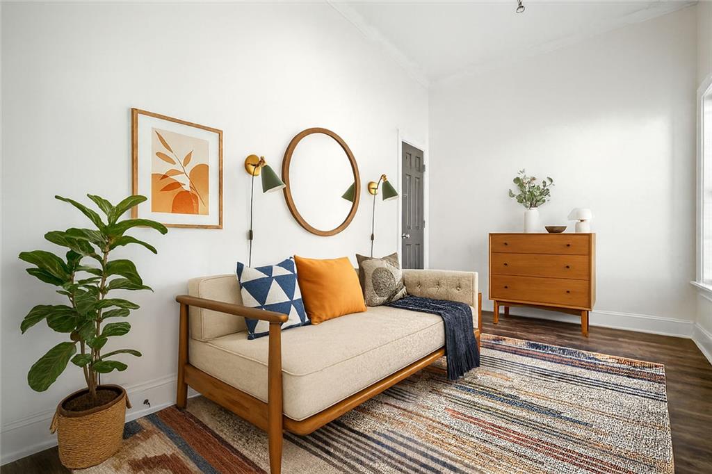 1635 Briarcliff Rd Road, Unit 8 Atlanta, GA 30306 - Photo 16 of 29 a bed room with a bed lamp and a potted plant