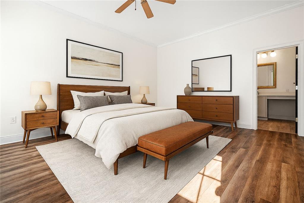 1635 Briarcliff Rd Road, Unit 8 Atlanta, GA 30306 - Photo 21 of 29 a bedroom with a bed and wooden floor