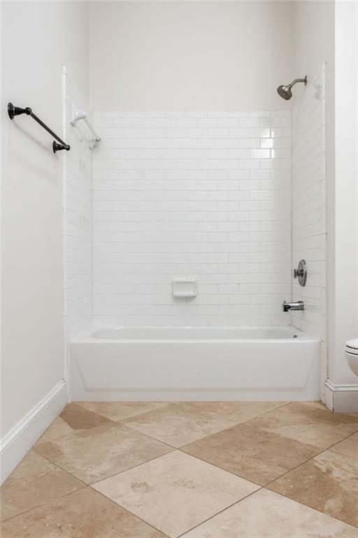 1635 Briarcliff Rd Road, Unit 8 Atlanta, GA 30306 - Photo 25 of 29 a bathroom with a bathtub and a shower