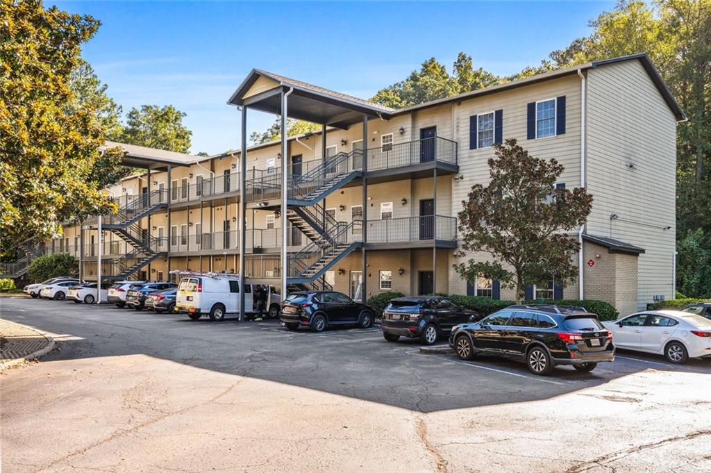 1635 Briarcliff Rd Road, Unit 8 Atlanta, GA 30306 - Photo 28 of 29 a car parked in front of a building