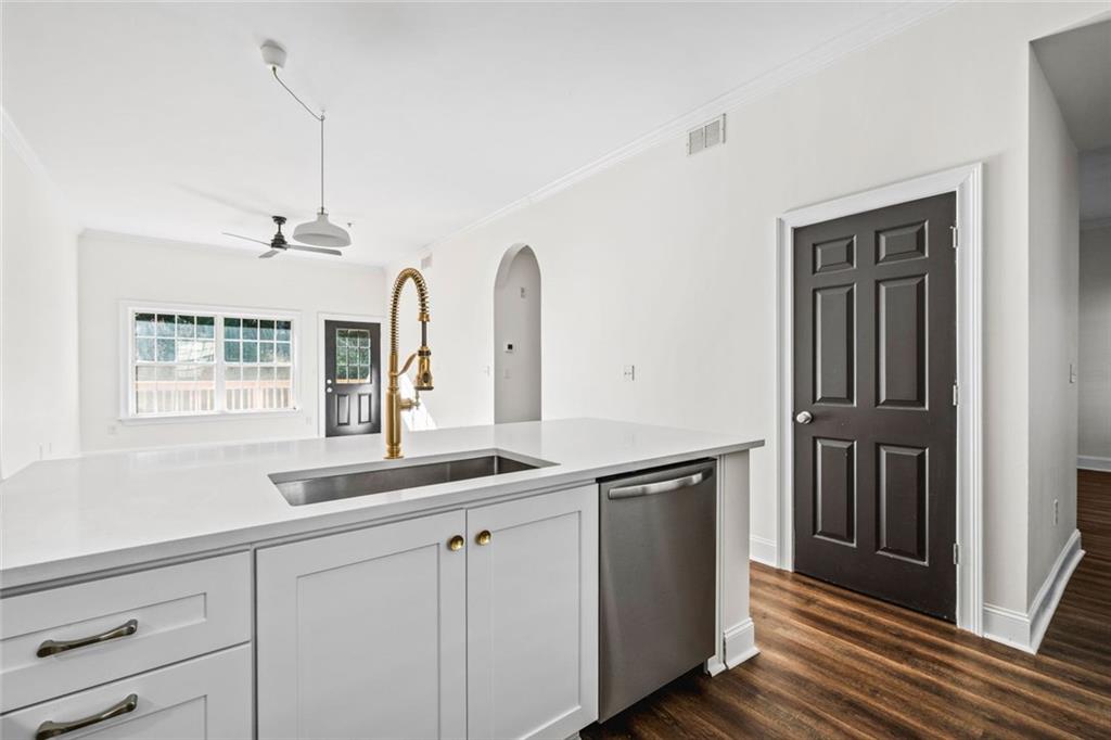1635 Briarcliff Rd Road, Unit 8 Atlanta, GA 30306 - Photo 5 of 29 a kitchen with a sink and a window