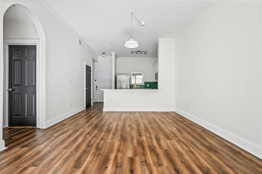 1635 Briarcliff Rd Road, Unit 8 Atlanta, GA 30306 - Photo 8 of 29 a view of a room with wooden floor and a sink