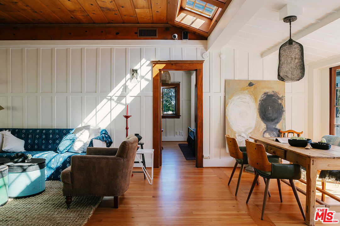 1954 Pinehurst Road Los Angeles, CA 90068 - Photo 1 of 42 a living room with furniture and wooden floor