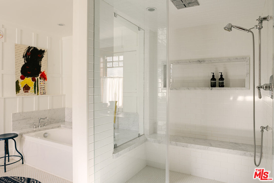 1954 Pinehurst Road Los Angeles, CA 90068 - Photo 30 of 42 a bathroom with a bathtub and a shower