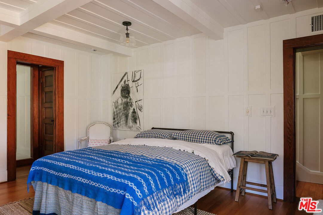 1954 Pinehurst Road Los Angeles, CA 90068 - Photo 32 of 42 a bedroom with a bed and a table
