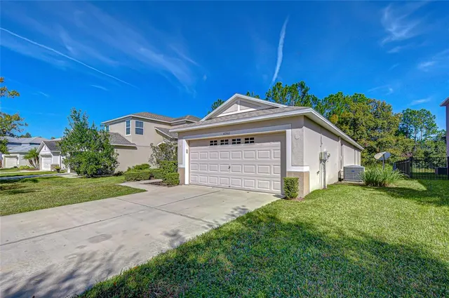 $349,999 | 4246 Warwick Hills Drive, Wesley Chapel, FL 33543
