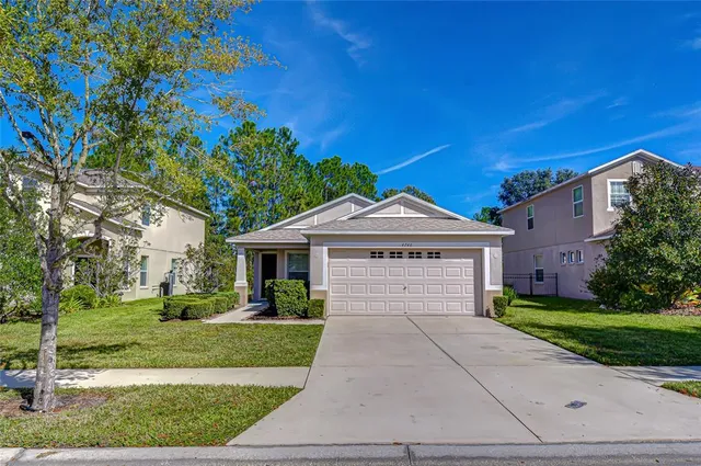 $349,999 | 4246 Warwick Hills Drive, Wesley Chapel, FL 33543