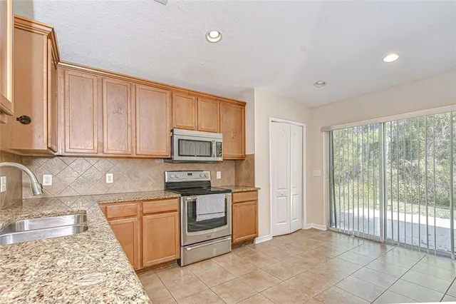 $349,999 | 4246 Warwick Hills Drive, Wesley Chapel, FL 33543