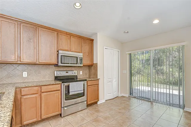 $349,999 | 4246 Warwick Hills Drive, Wesley Chapel, FL 33543