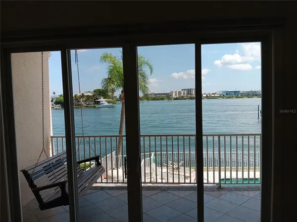 a view of a glass door from a balcony